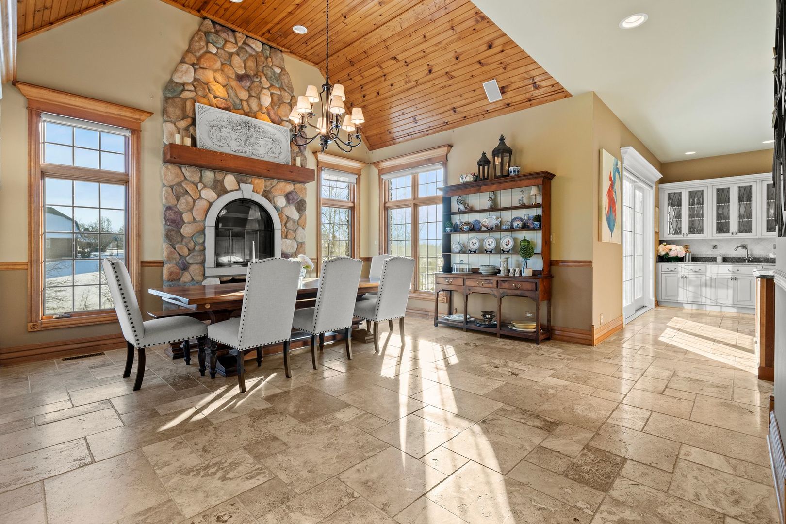 109 Singletree Road Orland Park, IL 60467 - Photo 19 of 66 a living room with furniture a fireplace and a large window