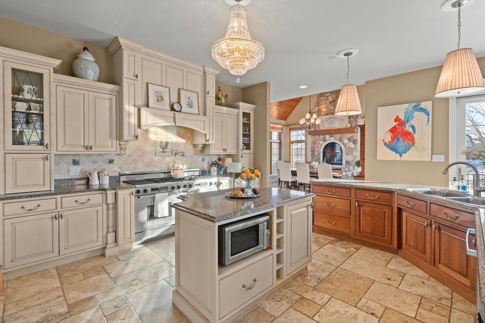 109 Singletree Road Orland Park, IL 60467 - Photo 27 of 66 a kitchen with granite countertop a sink stove and cabinets