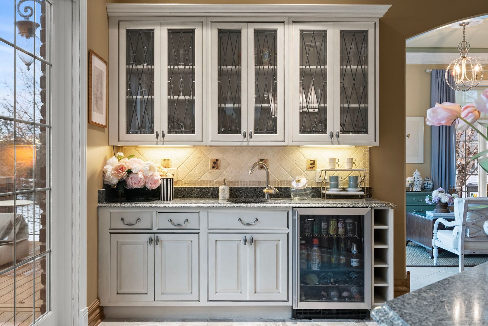 109 Singletree Road Orland Park, IL 60467 - Photo 28 of 66 a kitchen with granite countertop a sink and cabinets