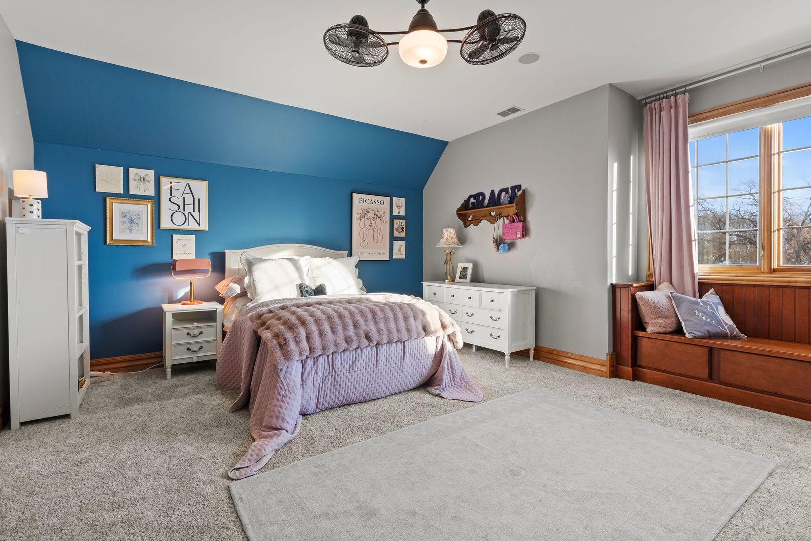 109 Singletree Road Orland Park, IL 60467 - Photo 38 of 66 a bedroom with a bed and a chandelier