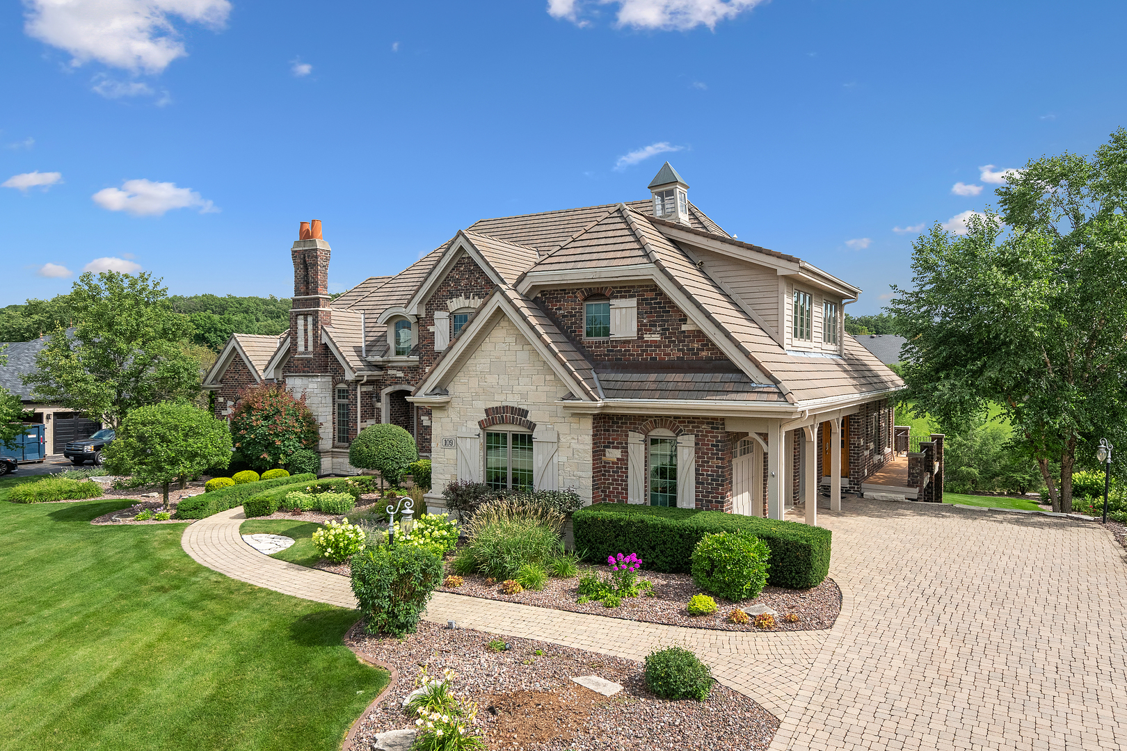 109 Singletree Road Orland Park, IL 60467 - Photo 57 of 66 a front view of a house with a yard