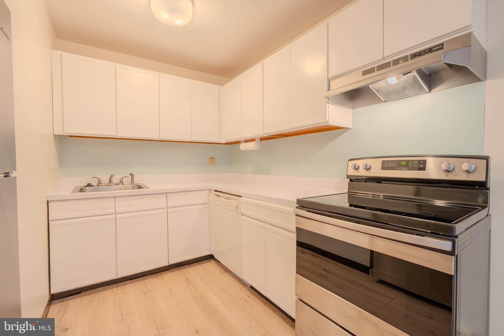 1016 West Baltimore Pike, Unit C11 Media, PA 19063 - Photo 8 of 18 a kitchen with cabinets and appliances
