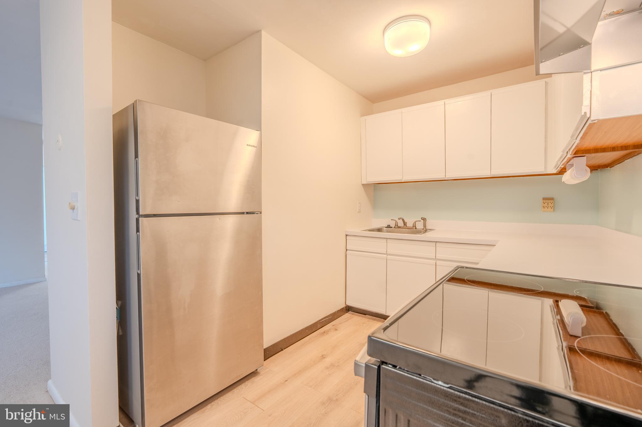 1016 West Baltimore Pike, Unit C11 Media, PA 19063 - Photo 9 of 18 a utility room with dryer and washer