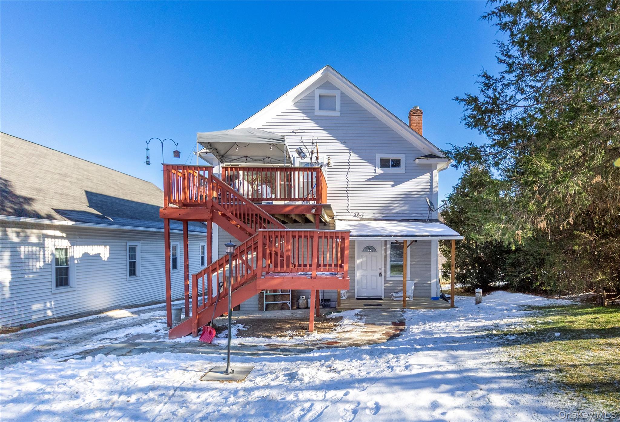 33 Holmes Road, Unit B Holmes, NY 12531 - Photo 1 of 16 a front view of a house with garden