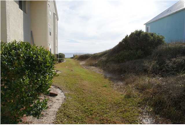 6015 Highway Santa Rosa Beach, Unit 2B 30A Santa Rosa Beach, FL 32459 - Photo 8 of 11 a view of a yard