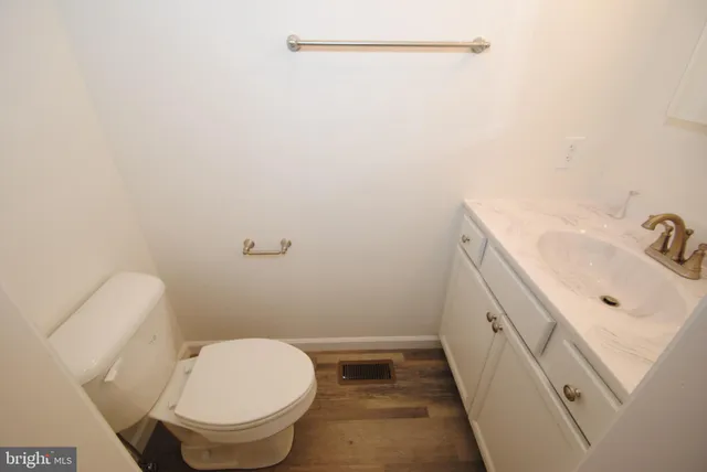 a bathroom with a sink and a vanity