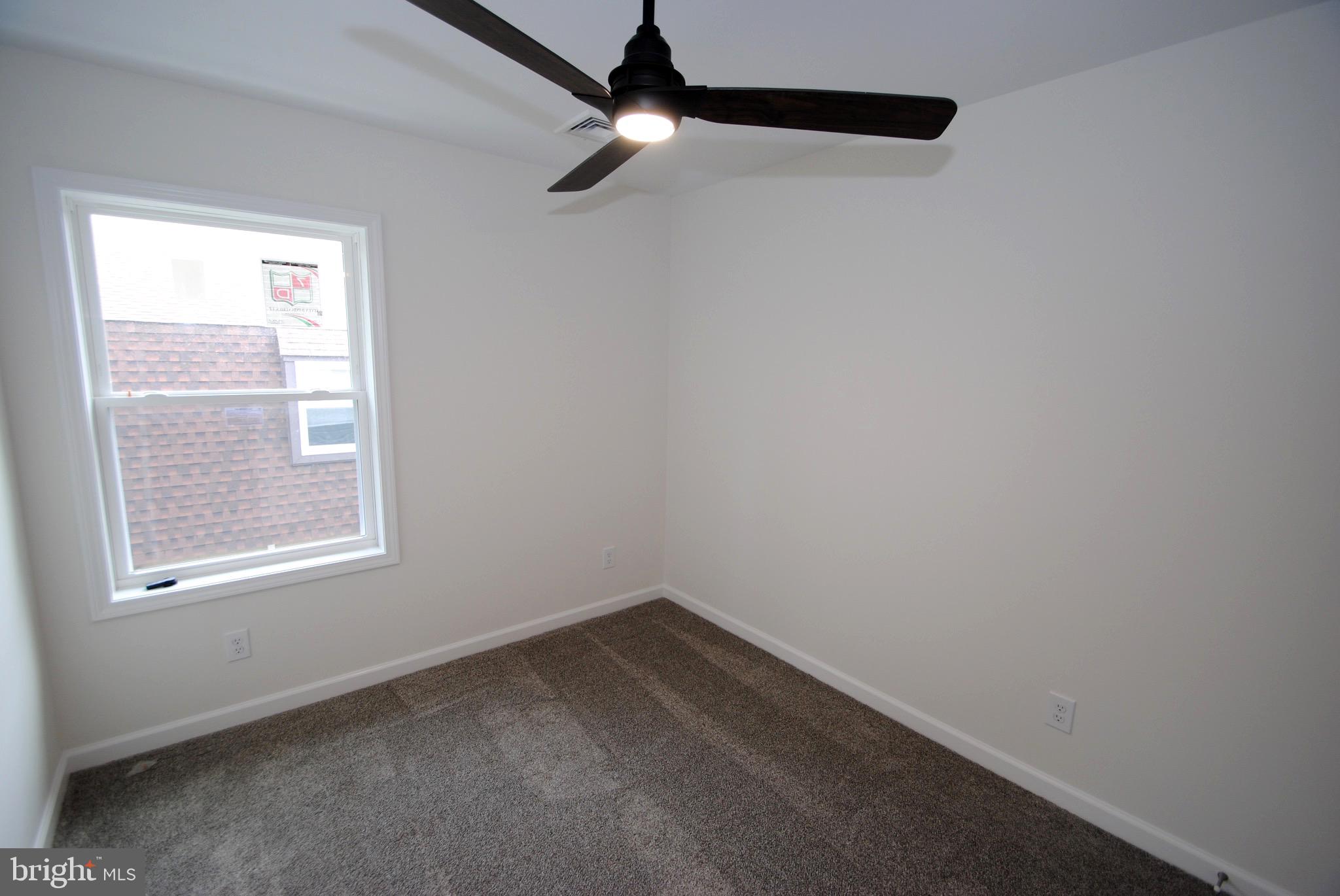 119-121 West 3rd Street Moorestown, NJ 08057 - Photo 16 of 25 an empty room with a window