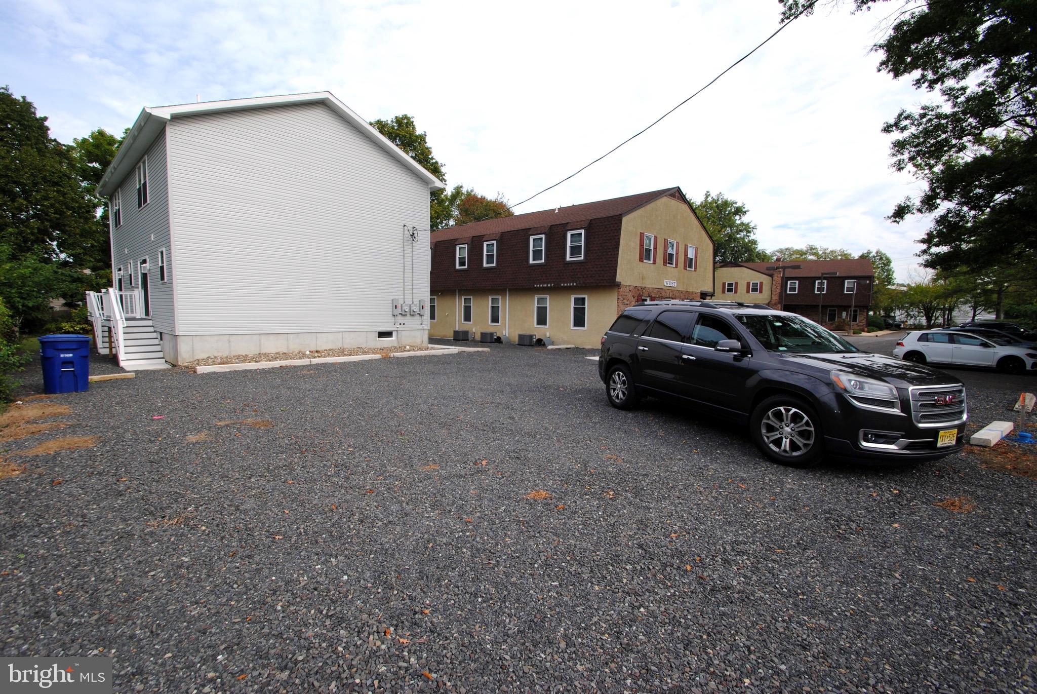 119-121 West 3rd Street Moorestown, NJ 08057 - Photo 3 of 25 a view of a car parked in front of a house