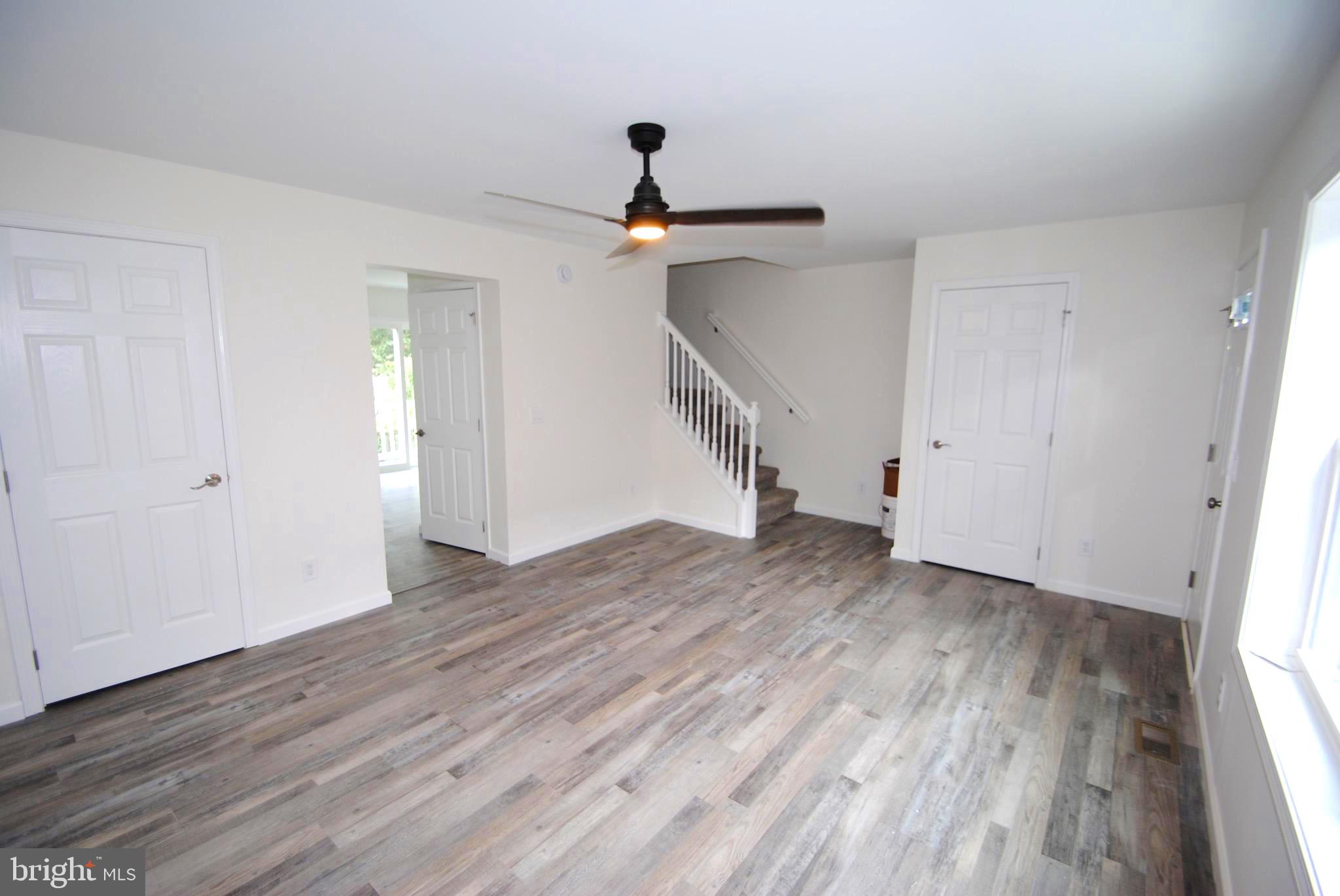 119-121 West 3rd Street Moorestown, NJ 08057 - Photo 5 of 25 wooden floor in an empty room with a window