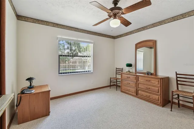 a view of room with furniture and a window