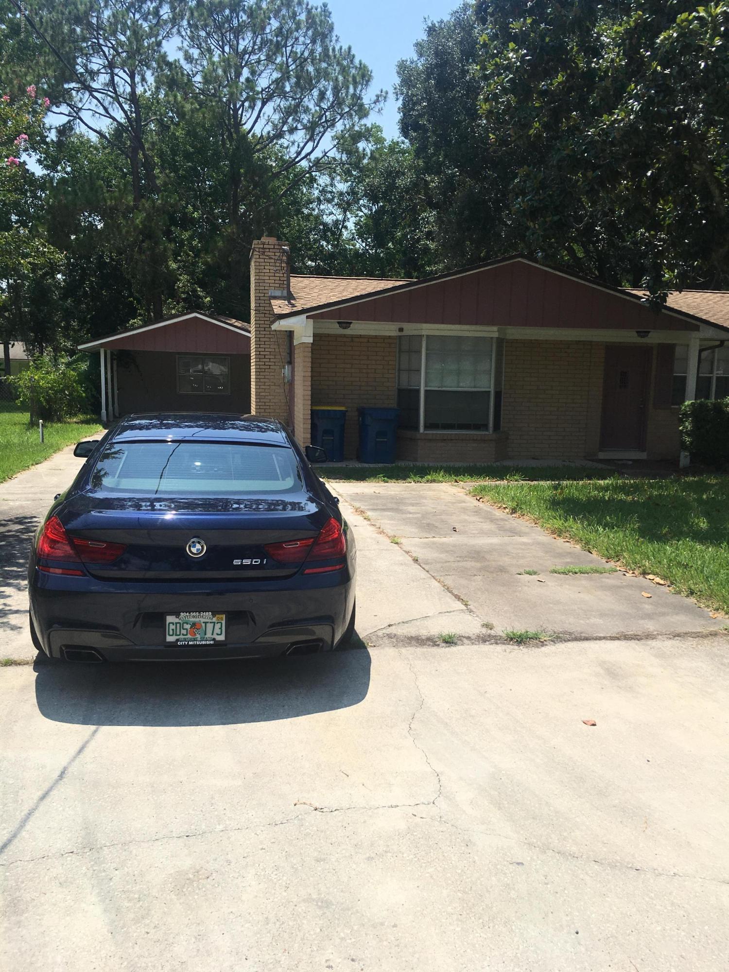 a car parked in front of house