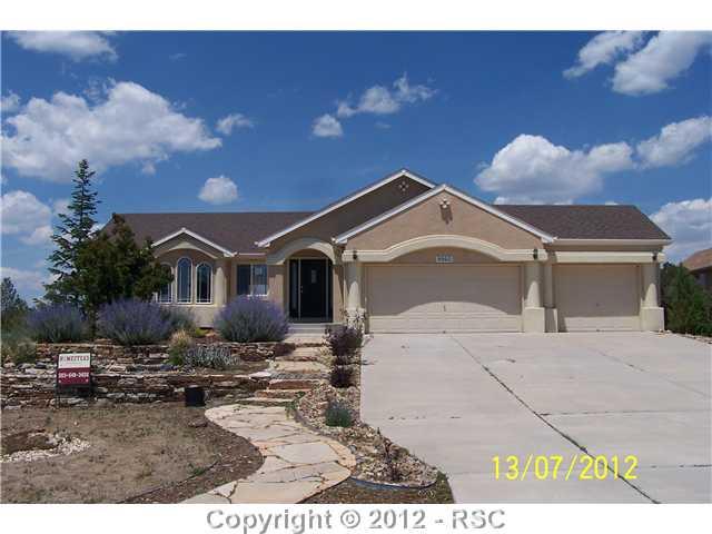 9960 Rockingham Drive Peyton, CO 80831 - Photo 1 of 13