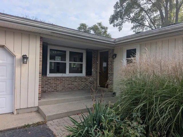 front view of a house with a shower