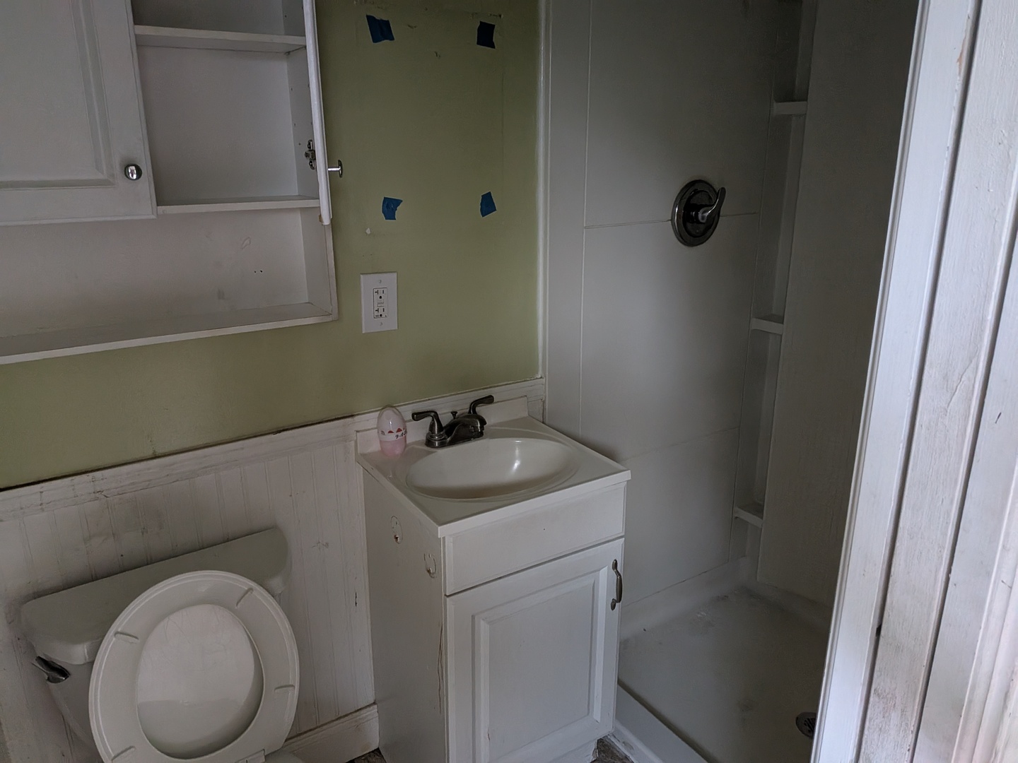 1718 Lincoln Road McHenry, IL 60051 - Photo 12 of 16 a bathroom with a toilet sink and mirror