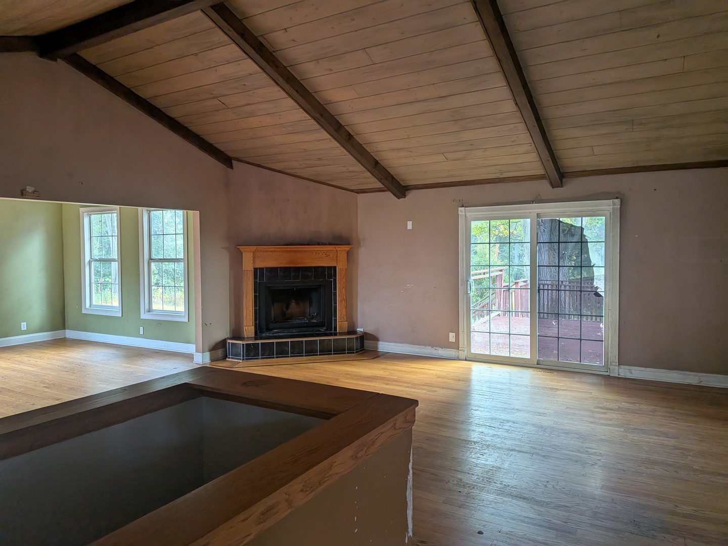 1718 Lincoln Road McHenry, IL 60051 - Photo 3 of 16 a view of an empty room with wooden floor and a window