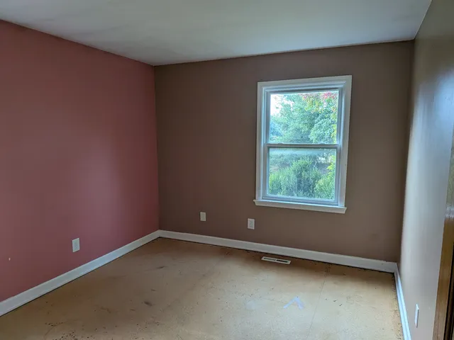 an empty room with a window