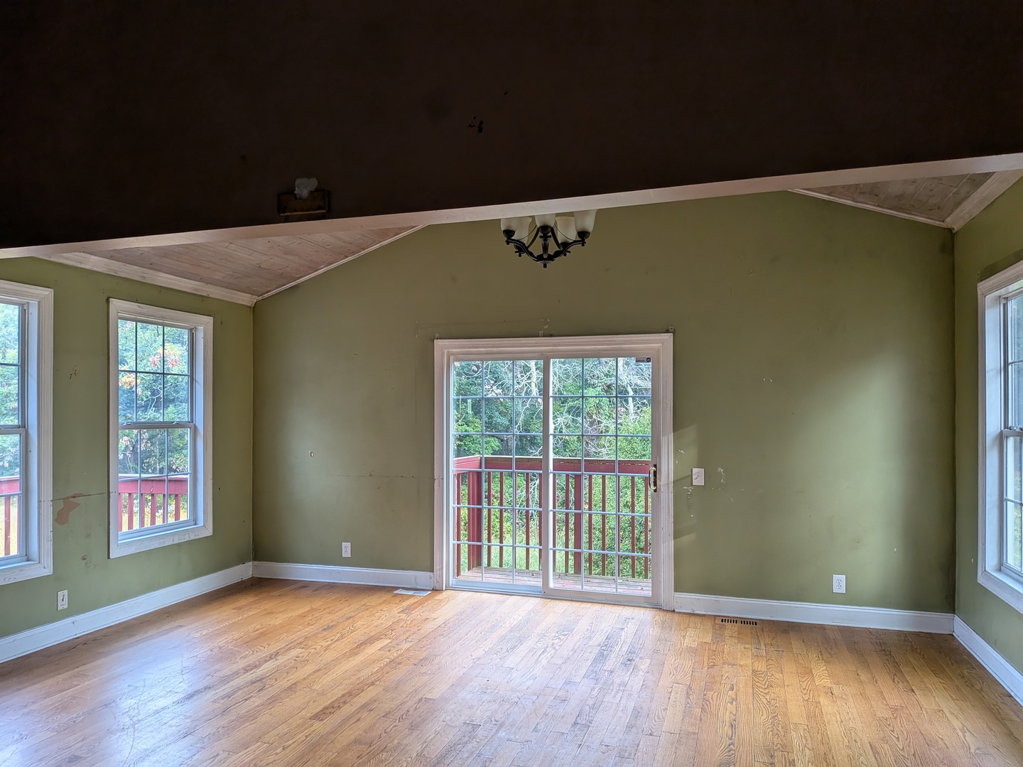 1718 Lincoln Road McHenry, IL 60051 - Photo 10 of 16 an empty room with wooden floor and windows