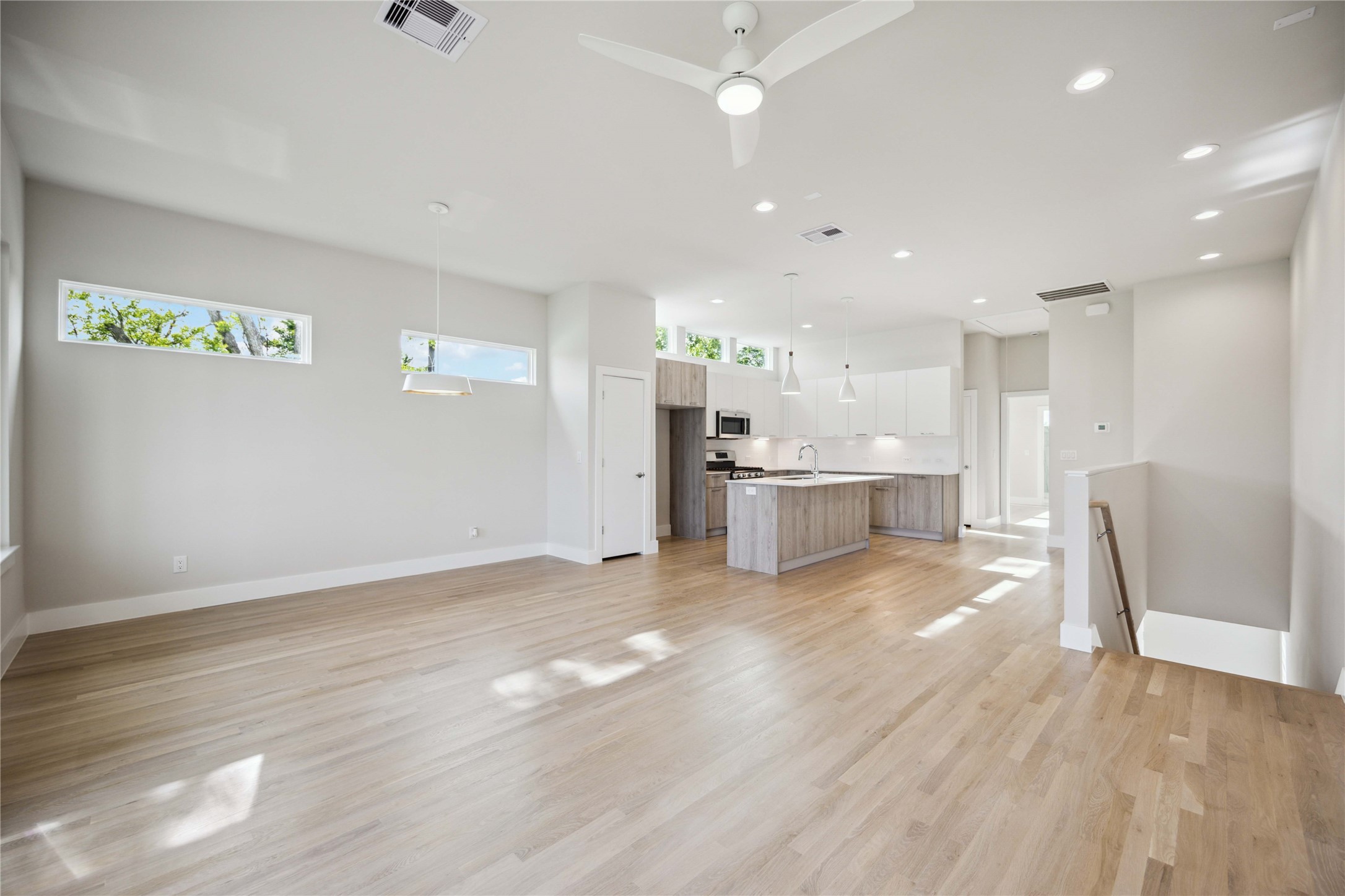 5314 Suez Street Houston, TX 77020 - Photo 10 of 27 a view of kitchen with kitchen island wooden floor cabinets and appliances