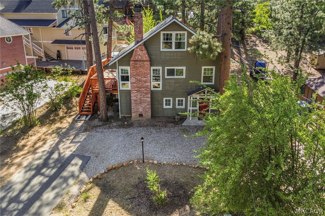 195 Elgin Road Big Bear Lake, CA 92315 - Photo 41 of 45 a front view of a house with a yard and an outdoor seating