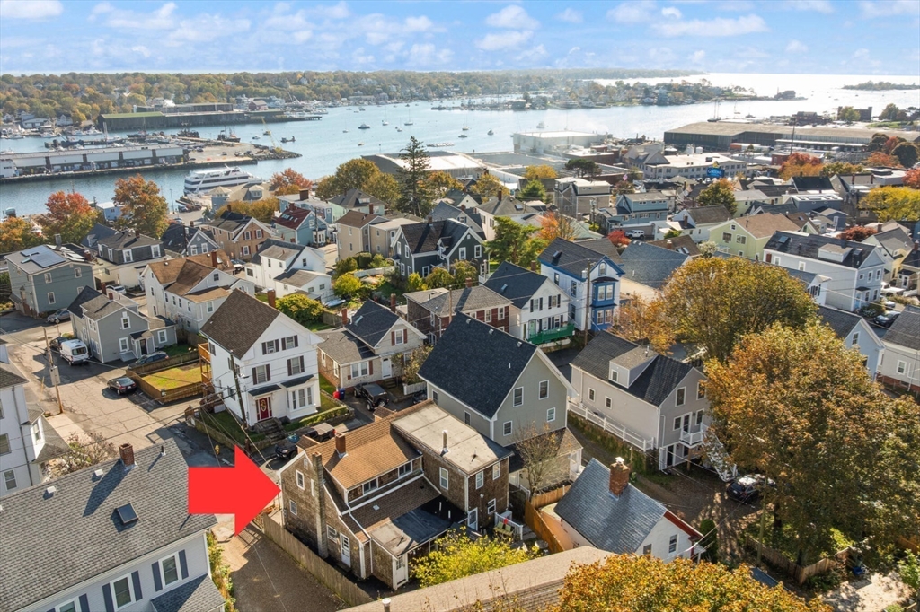 22 Taylor Street, Unit 1 Gloucester, MA 01930 - Photo 23 of 31 an aerial view of residential houses with outdoor space