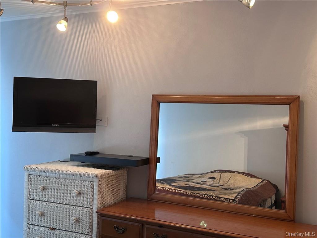 407 Old Mill Road Southfields, NY 10975 - Photo 13 of 29 a room with a couch and a flat screen tv