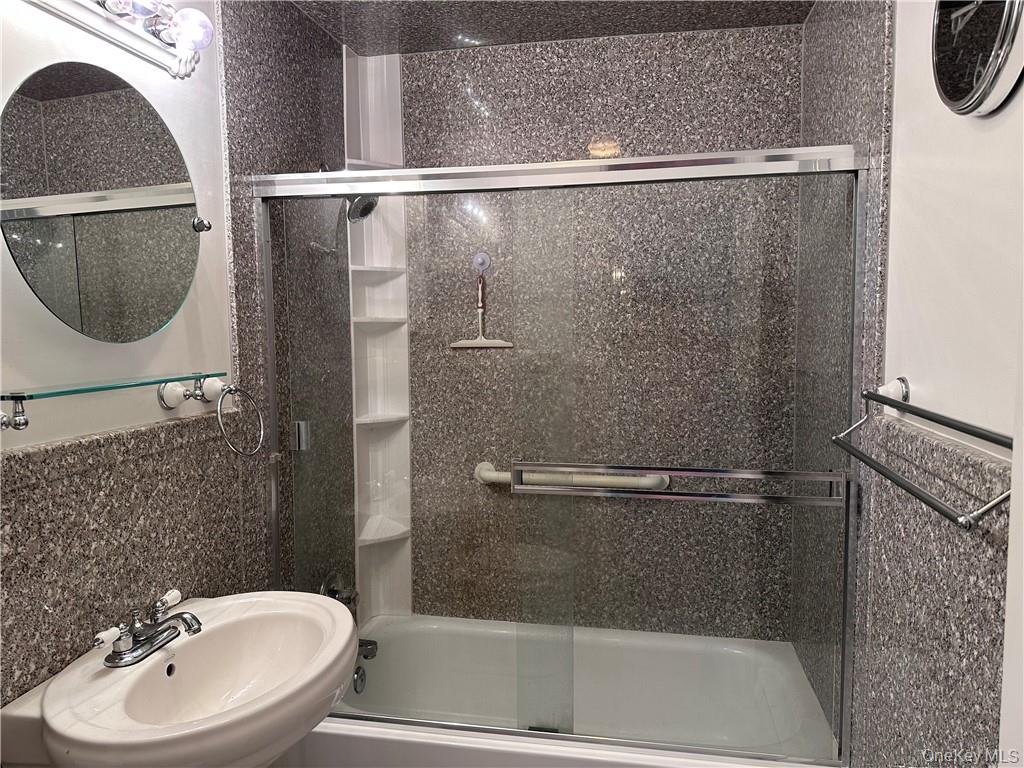 407 Old Mill Road Southfields, NY 10975 - Photo 7 of 29 a bathroom with a sink a mirror and a shower