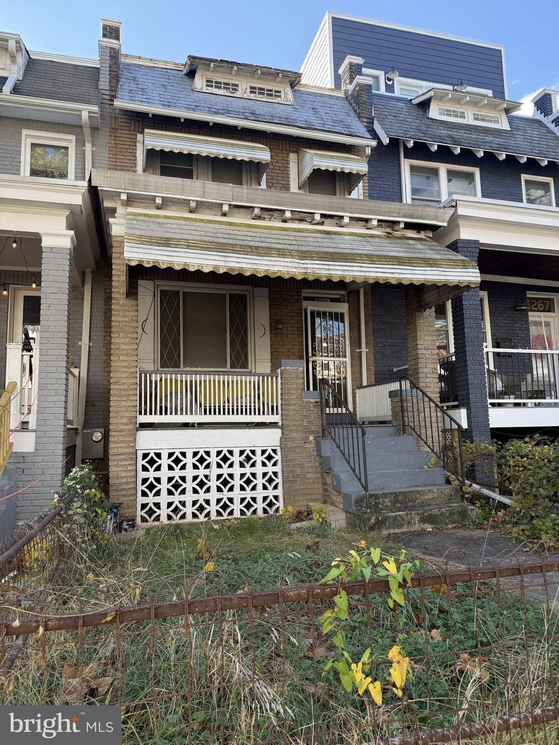 1269 Oates Street Northeast Washington, DC 20002 - Photo 1 of 13 a view of a building with many windows