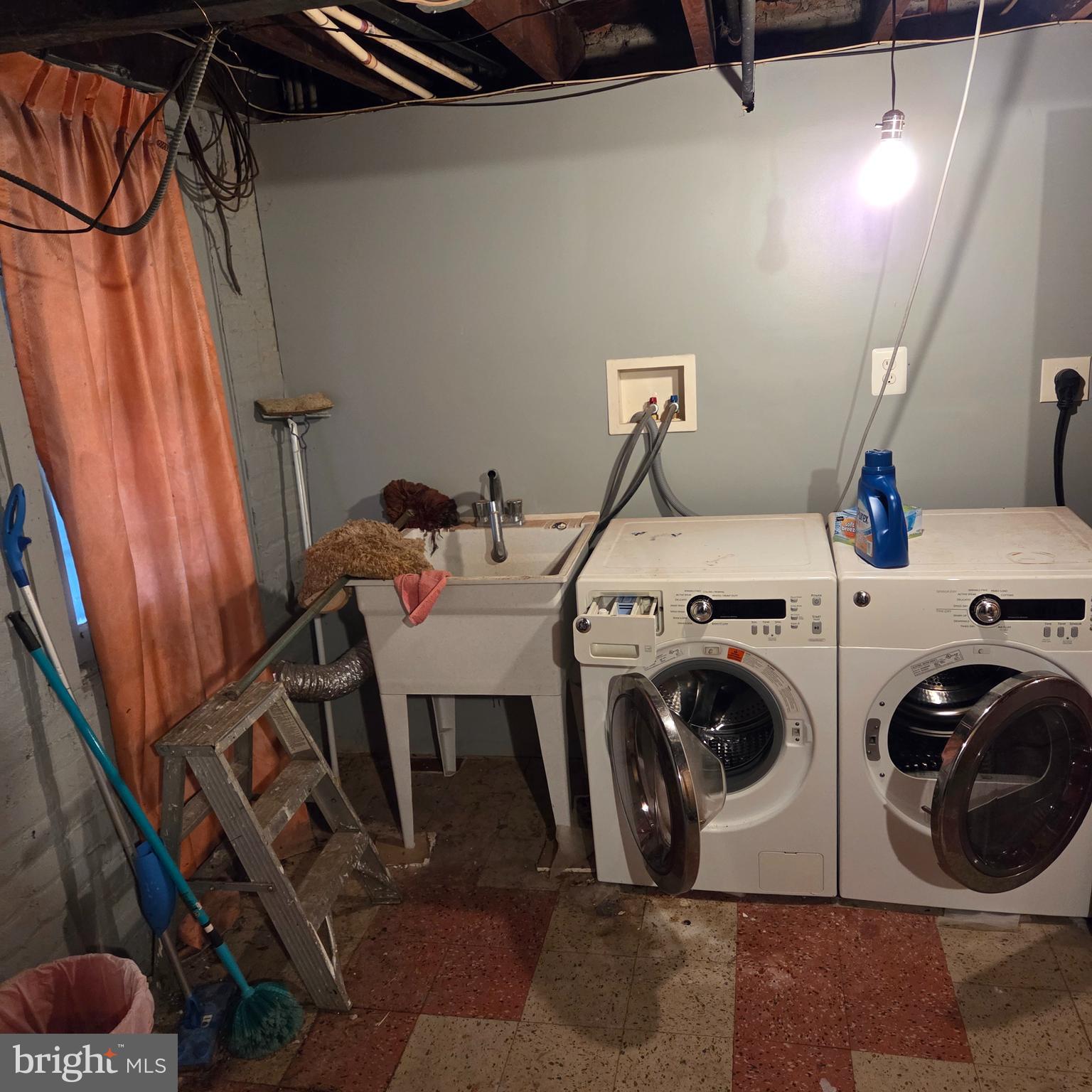1269 Oates Street Northeast Washington, DC 20002 - Photo 11 of 13 a utility room with dryer and washer