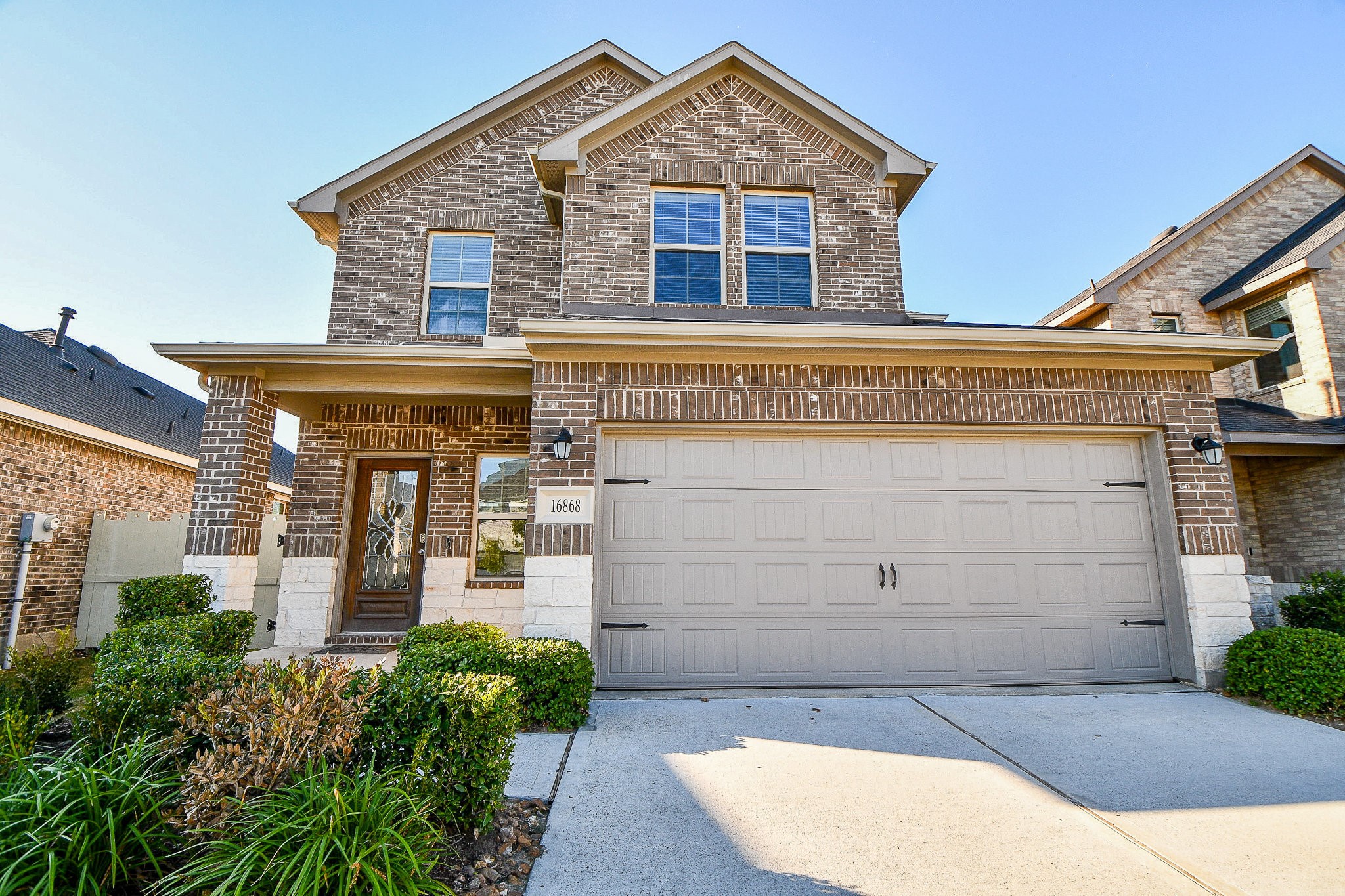 16868 Pink Wintergreen Drive Conroe, TX 77385 - Photo 1 of 32 front view of a house