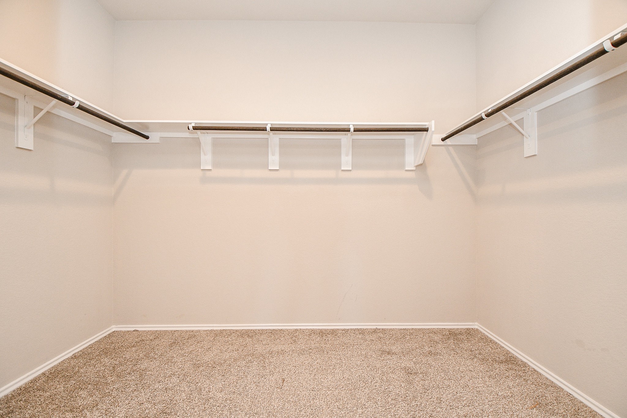 16868 Pink Wintergreen Drive Conroe, TX 77385 - Photo 27 of 32 a view of an empty walk in closet