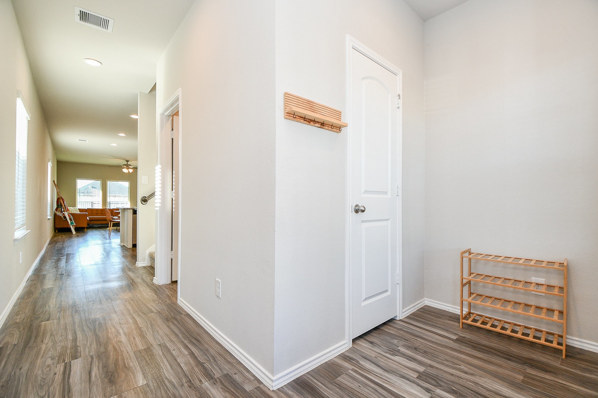 16868 Pink Wintergreen Drive Conroe, TX 77385 - Photo 4 of 32 a view of a room with wooden floor