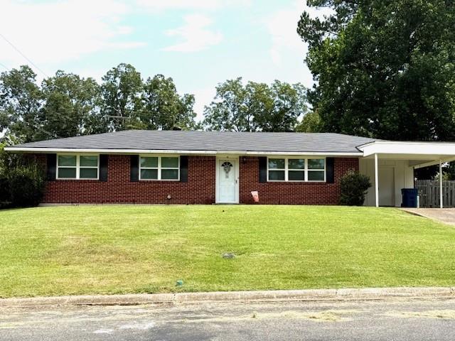 104 Oak Street Homer, LA 71040 - Photo 2 of 29 a front view of house with yard and green space