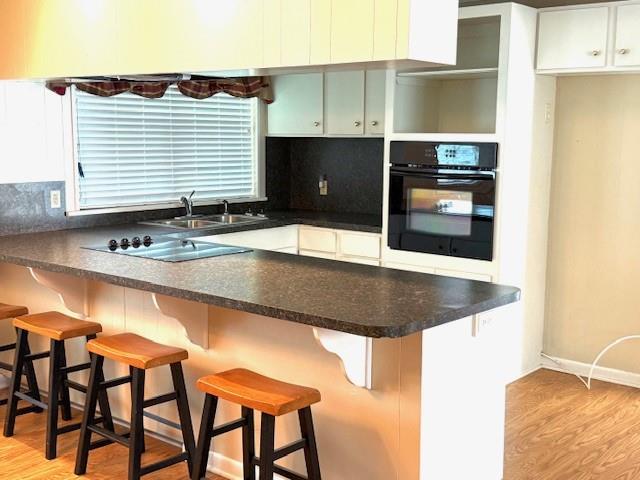 104 Oak Street Homer, LA 71040 - Photo 5 of 29 a kitchen with a table and chairs