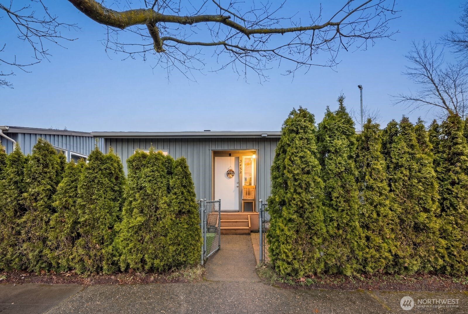 9452 25th Avenue Southwest Seattle, WA 98106 - Photo 1 of 37 a front view of a house with a yard