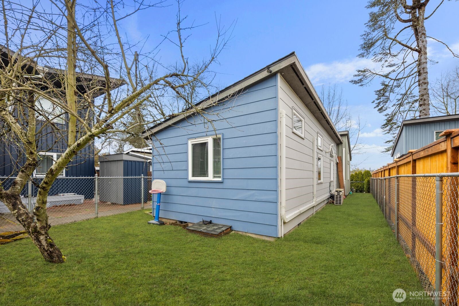 9452 25th Avenue Southwest Seattle, WA 98106 - Photo 27 of 37 a view of a house with a yard