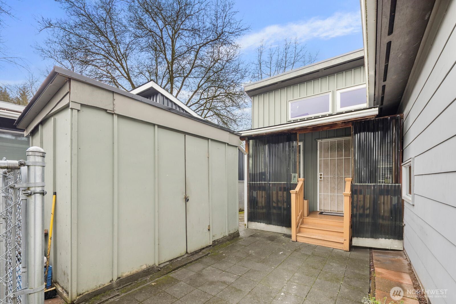 9452 25th Avenue Southwest Seattle, WA 98106 - Photo 37 of 37 a view of a house with backyard and sitting area