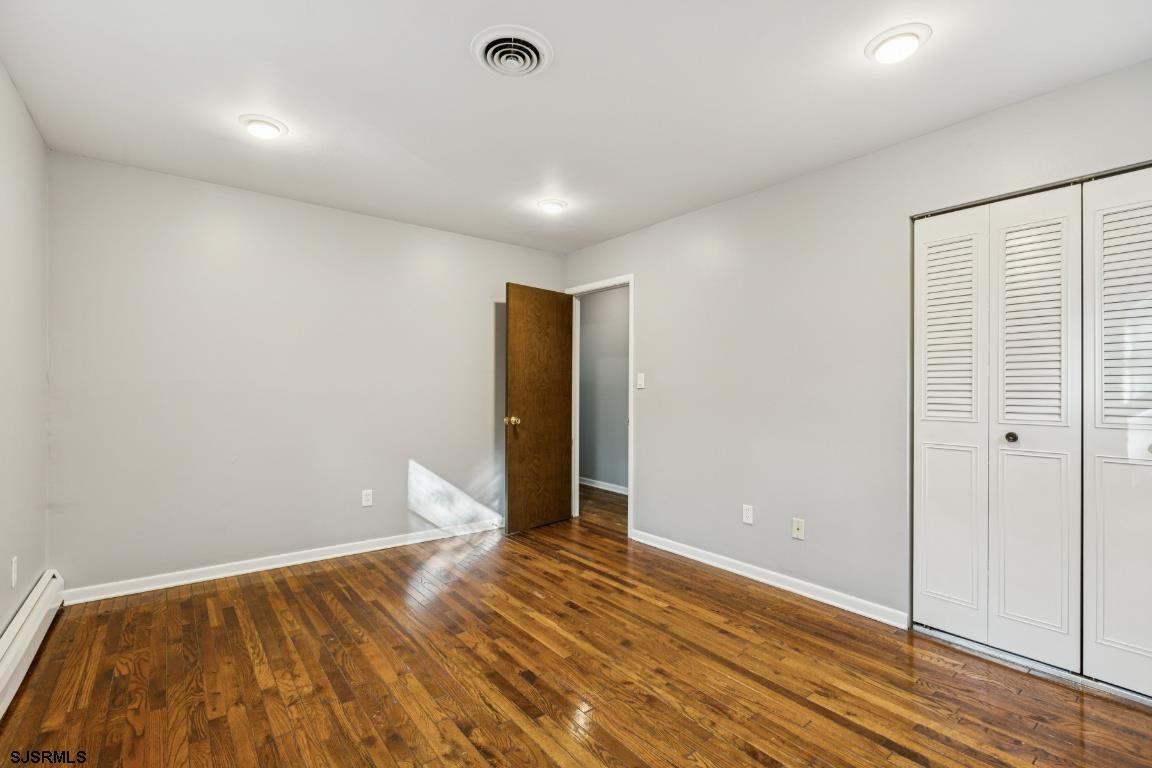 207 Sooy Place Road Tabernacle, NJ 08088 - Photo 13 of 25 wooden floor in an empty room