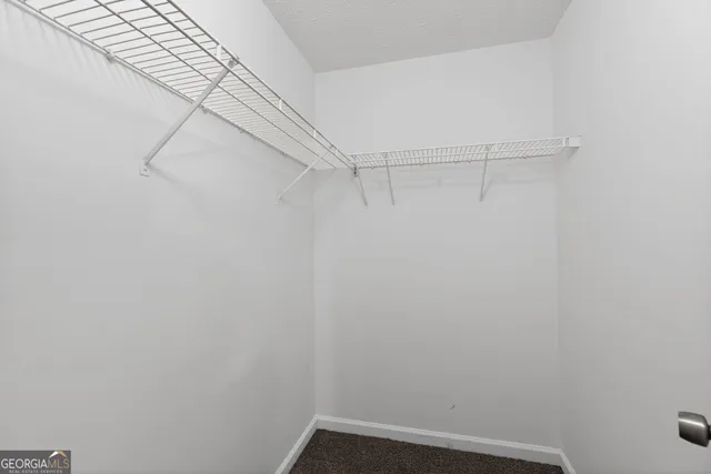 a view of small space with racks on the wall