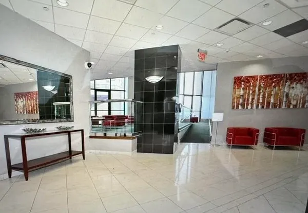 a living room with furniture and window