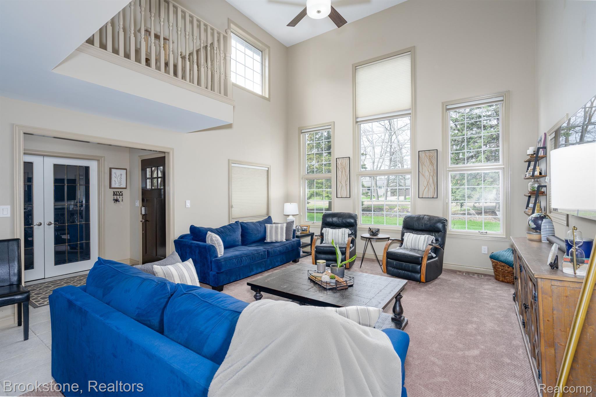 780 East Gunn Road Rochester, MI 48306 - Photo 11 of 56 Large great room with 2-story windows
