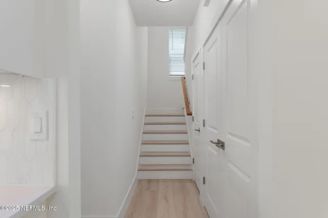 a view of entryway with stairs