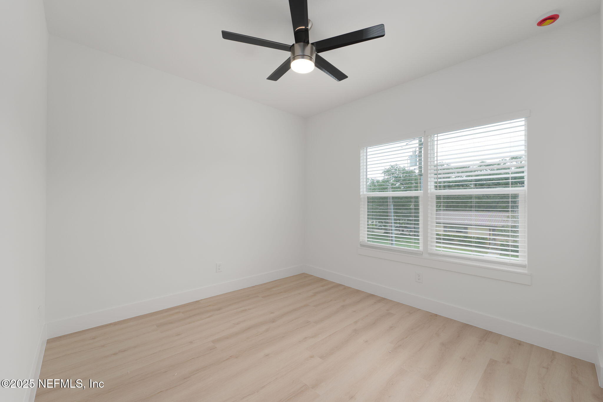 609 Twenty Second Street St. Augustine, FL 32084 - Photo 26 of 34 a view of an empty room with a window