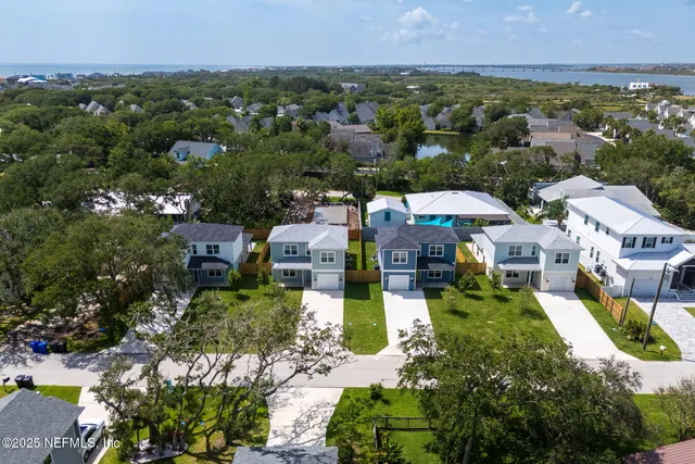 an aerial view of multiple house