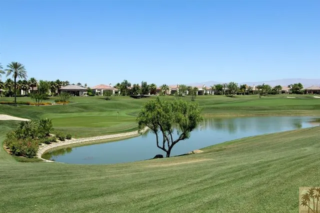 a view of a lake with a big yard