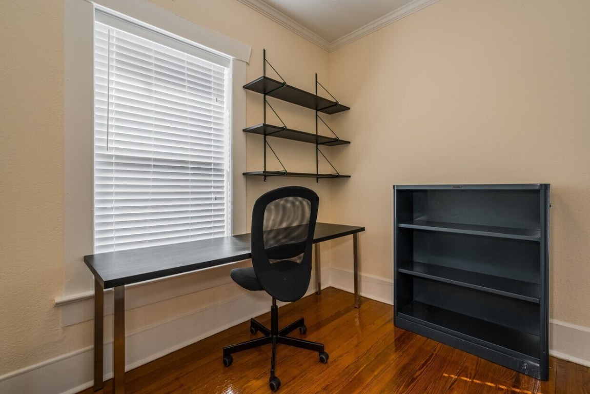 1159 Navasota Street Austin, TX 78702 - Photo 14 of 23 a view of a room with racks on the wall