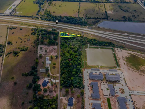 an aerial view of a highlighted house