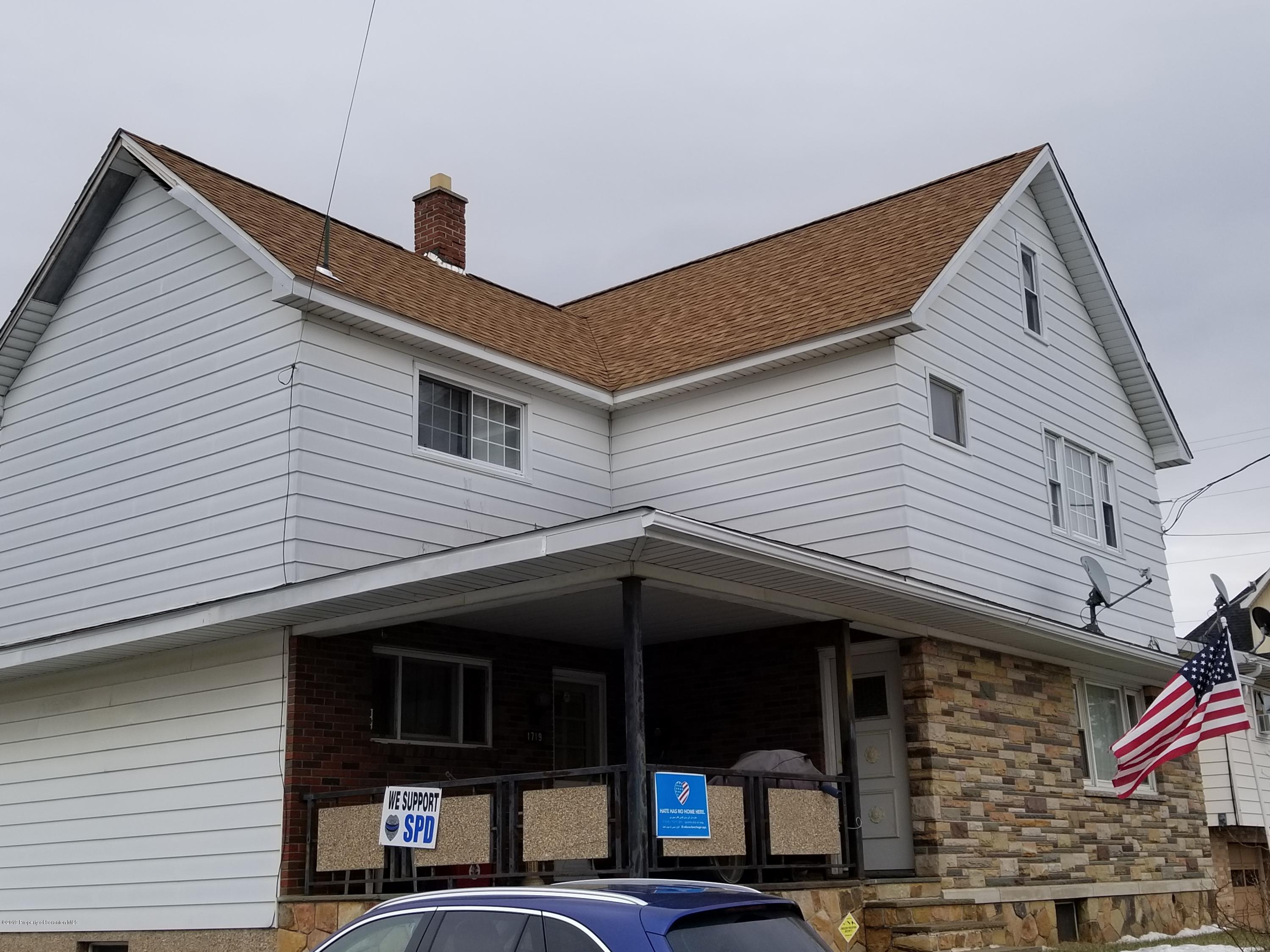 a view of a house with a porch