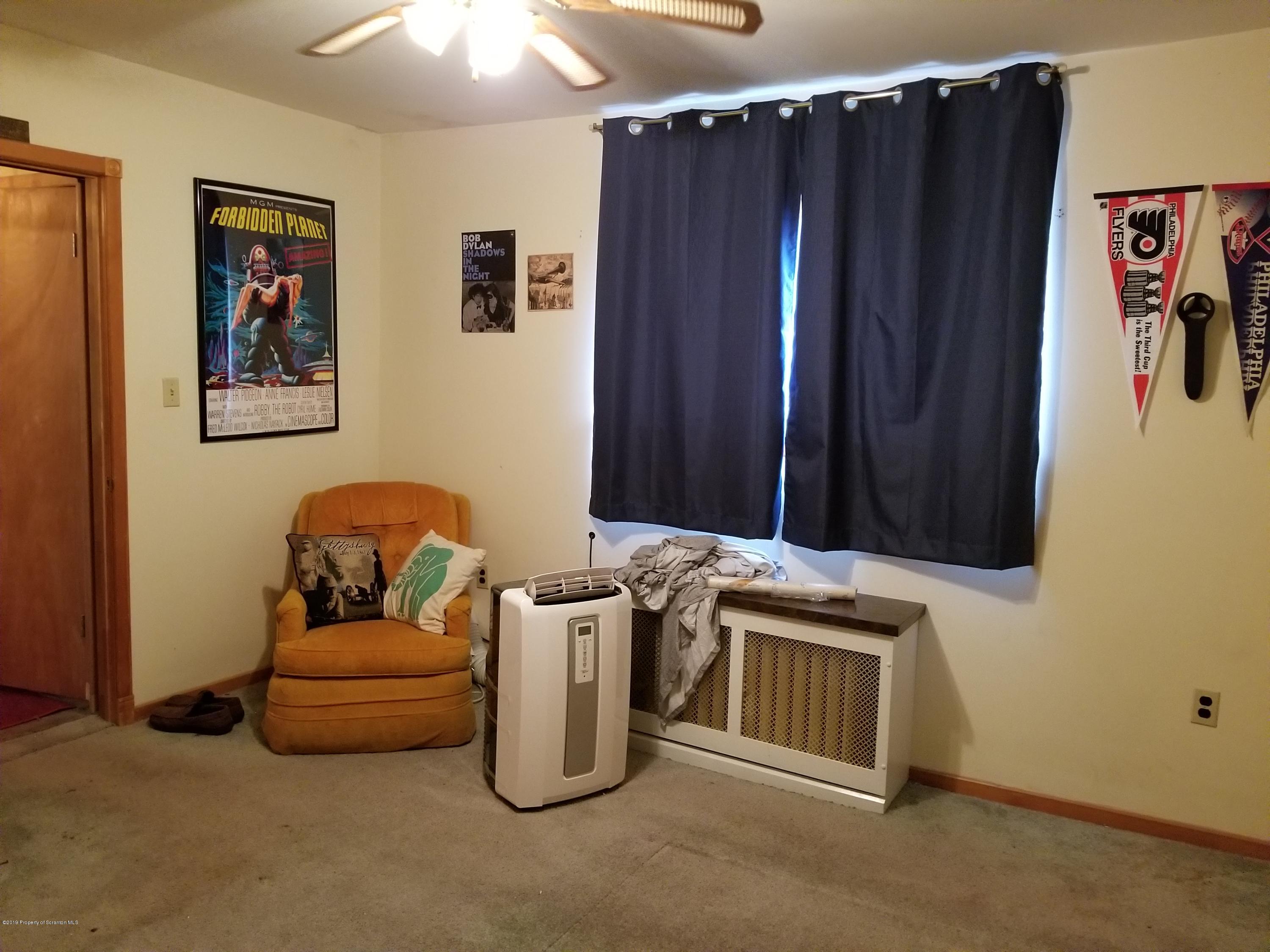 1719 Ash Street Scranton, PA 18510 - Photo 12 of 19 a room with furniture and a cabinet