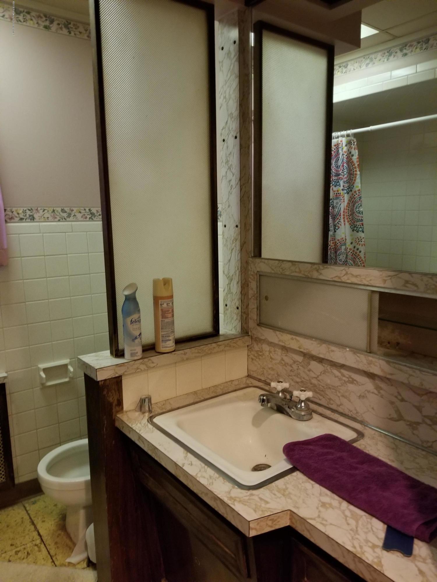 1719 Ash Street Scranton, PA 18510 - Photo 9 of 19 a bathroom with a sink and a toilet