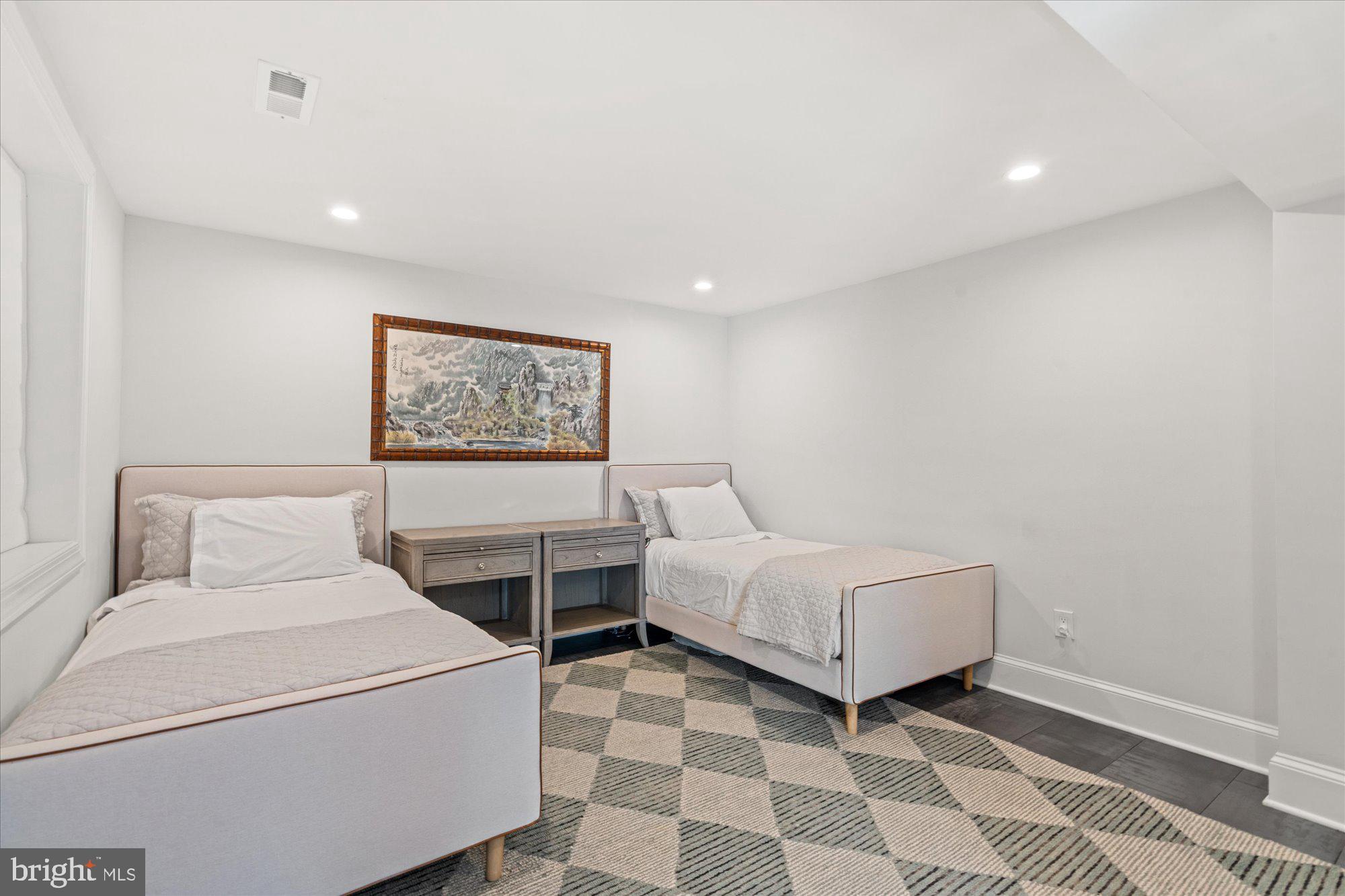 2610 Garfield Street Northwest Washington, DC 20008 - Photo 41 of 51 a room with two beds and a painting